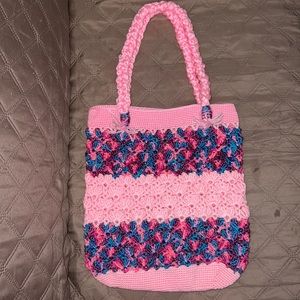 A handmade knitted bag from my mother. Never used. In very good condition.